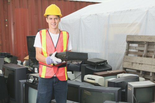 Professional waste management team clearing debris